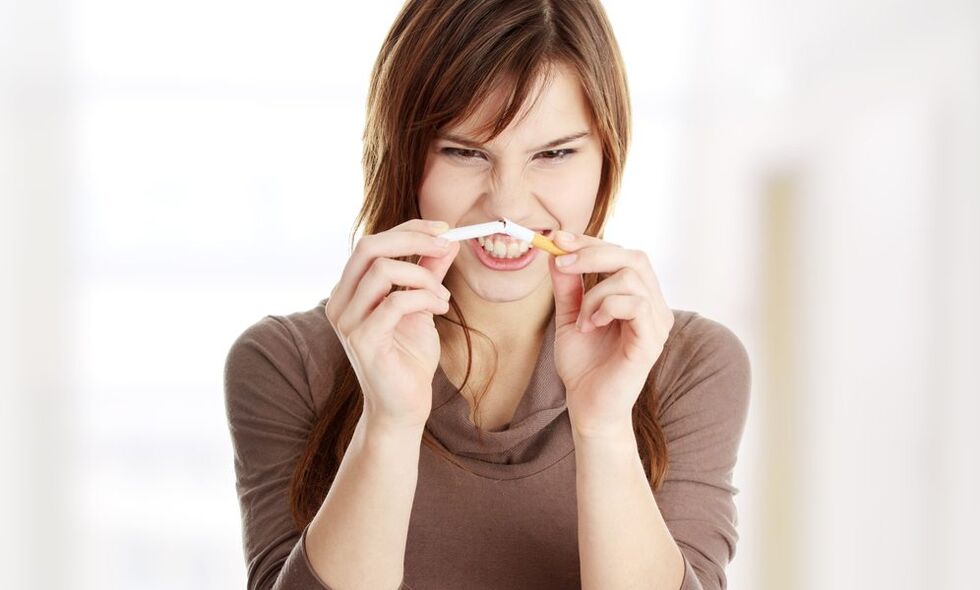 Girl broke a cigarette and quit smoking photo 1